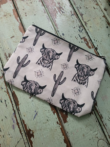 Highland cows and cacti makeup bag