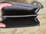 Tooled leather wristlet wallet