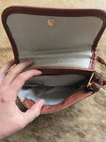 Tooled zippered crossbody purse