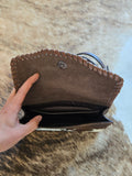 Cowhide and tooled leather crossbody purse