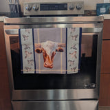 Cows Renee Gould tea towel