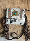 Cowhide crossbody purse with fringe