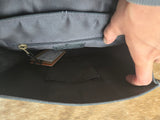 Tooled leather and cowhide purse