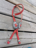 Red - One ear headstall with silver and red conchos and buckles