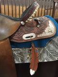 Leather saddle feathers